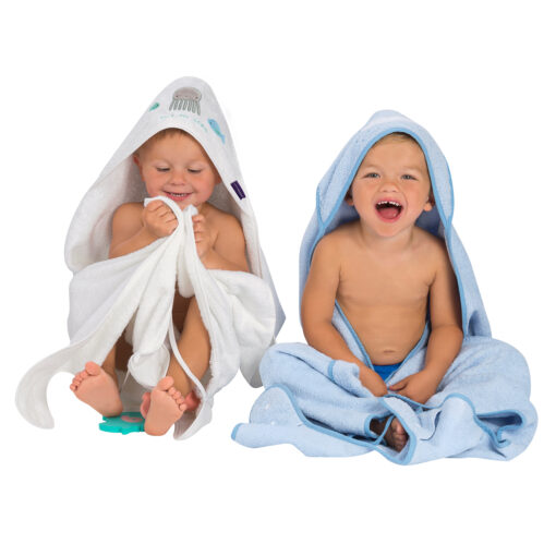two toddlers in hooded cotton bath towels