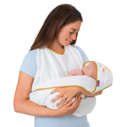 mother holding baby in a cotton baby towel