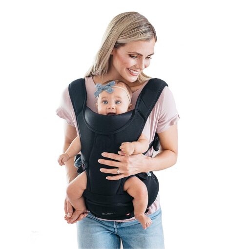 mother holding baby in hipster essential baby carrier