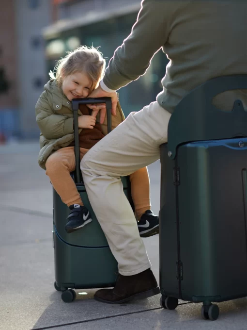 little girl on forest green miamily multicarry luggage